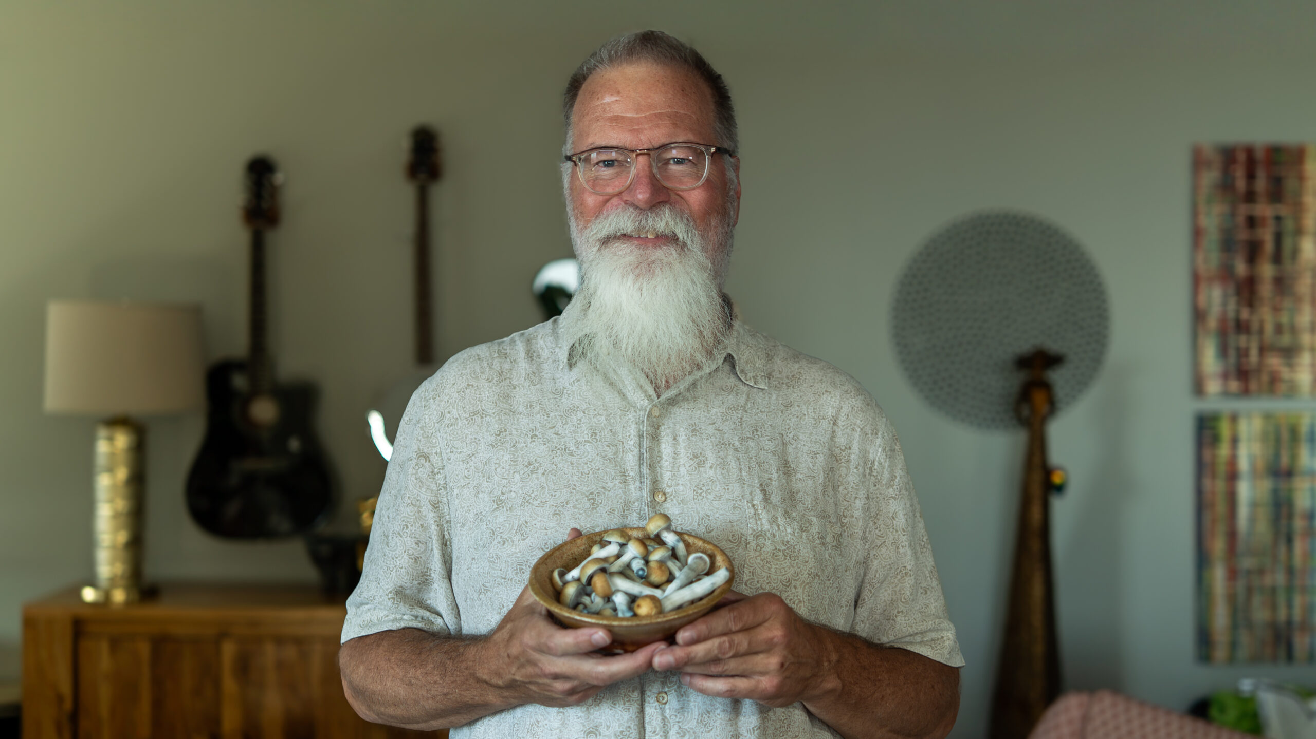 uncle steve holding mushrooms he's grown